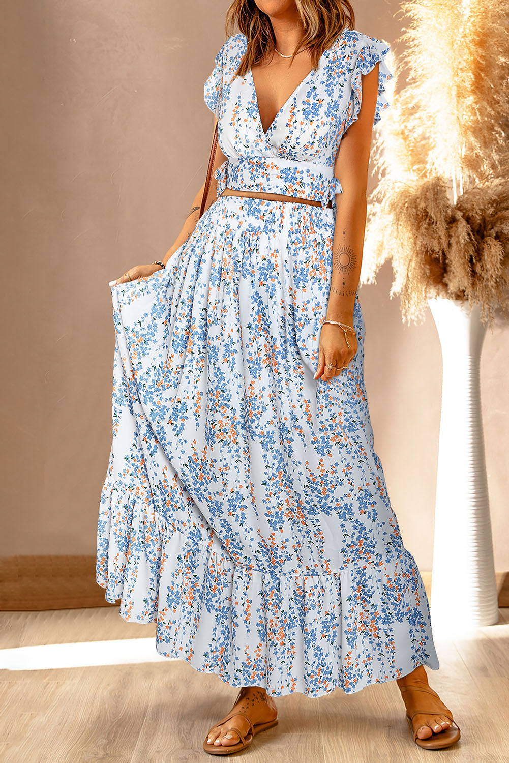 White Floral Ruffled Crop Top and Maxi Skirt Set with a 30% Discount the Price is $126.64 ($37.99 Savings)