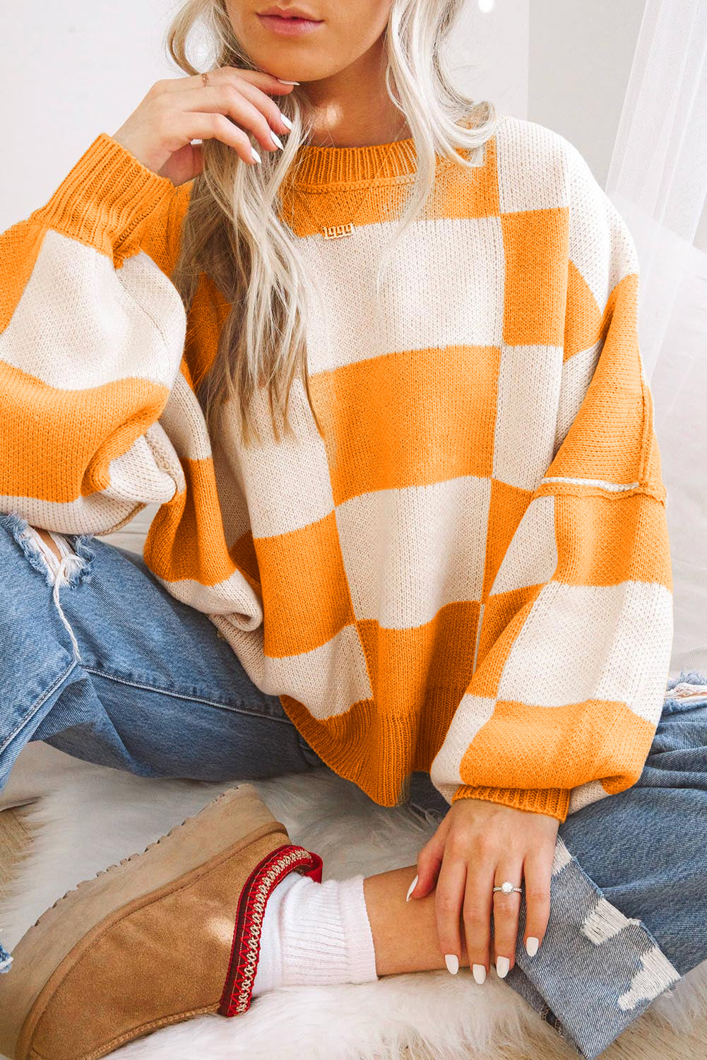 Orange Checkered Bishop Sleeve Sweater with a 30% Discount the Price is $80.47 ($34.49 Savings)